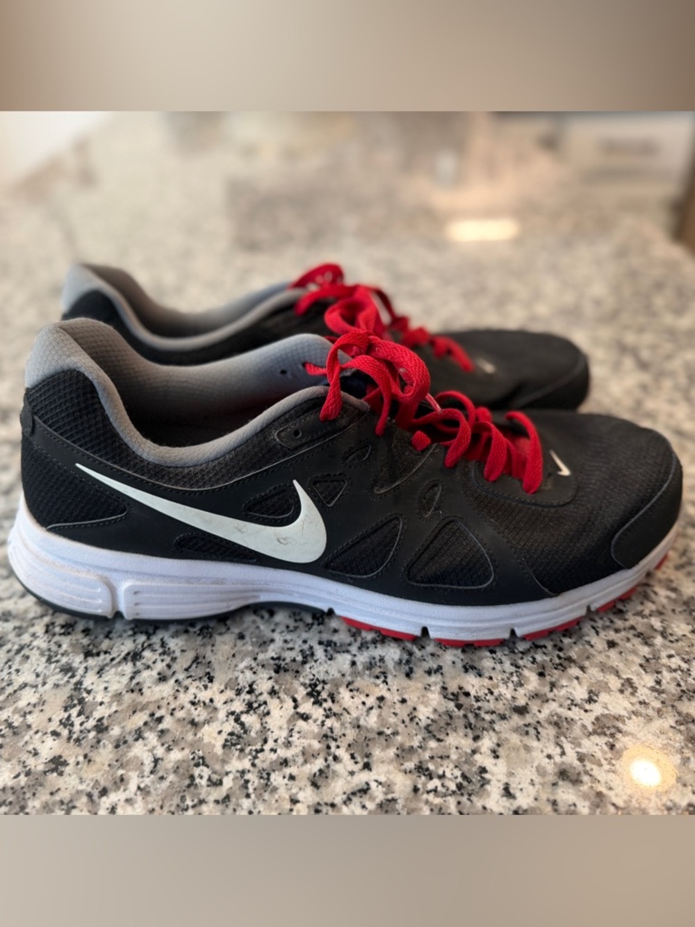 Nike Black Sneakers with Red Laces and White Swoosh